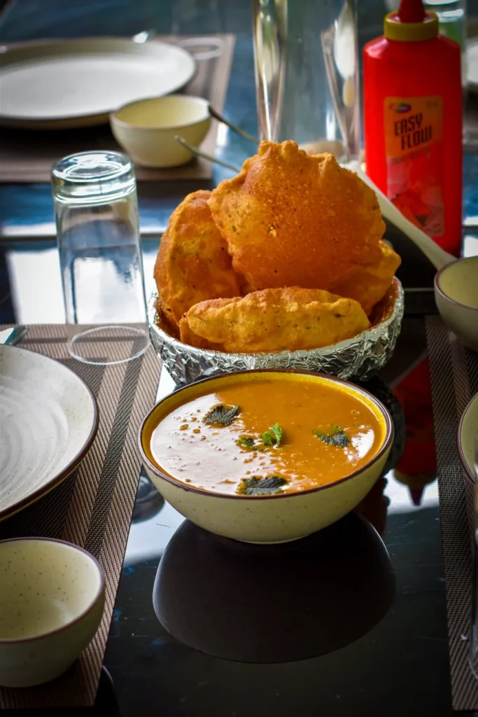 Traditional Indian poori curry served at Mukshwaa resort restaurant Mukteshwar